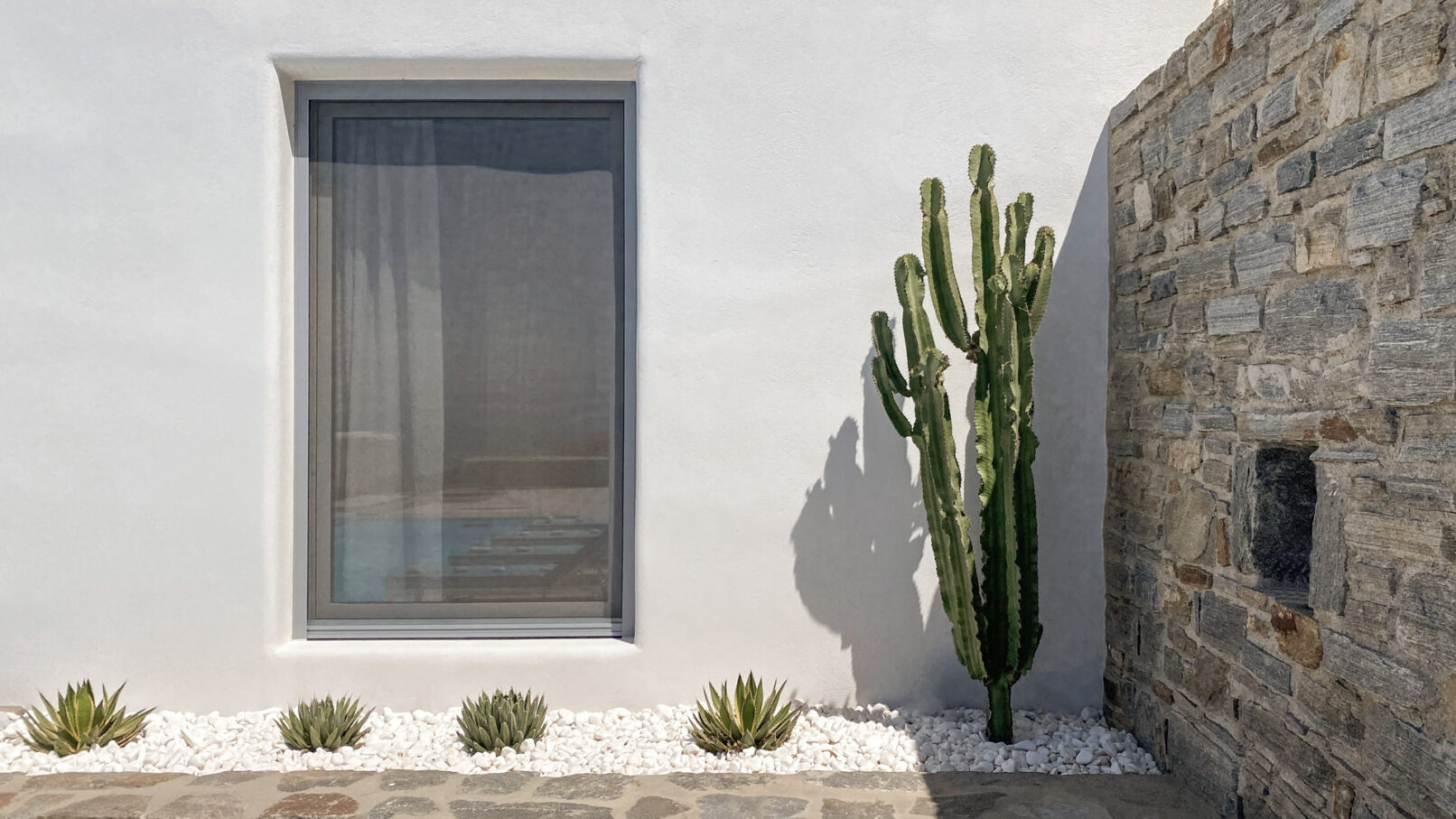 Pinthos Architects Naxos vacation summer house - villa. Cycladic island design in Aegean. Architecture facade details