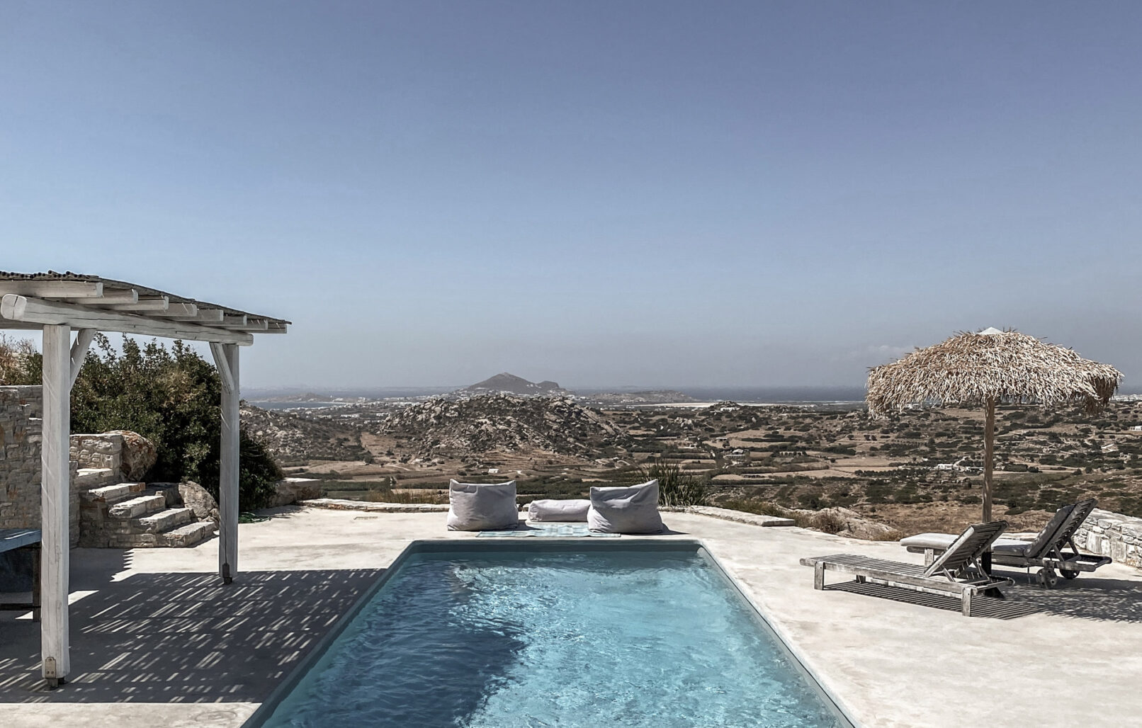 Pinthos Architects Naxos vacation summer house - villa. Cycladic island design in Aegean. Pool outdoor and lounge