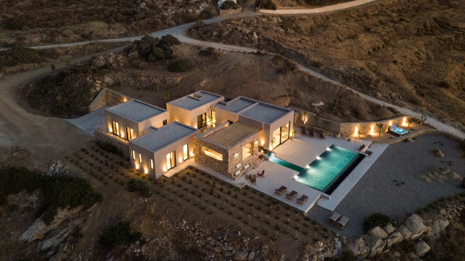 La Punta Villa in Naxos by PLINTHOS Architects: Cycladic architecture with stone, plaster, bioclimatic design, and stunning Aegean views.