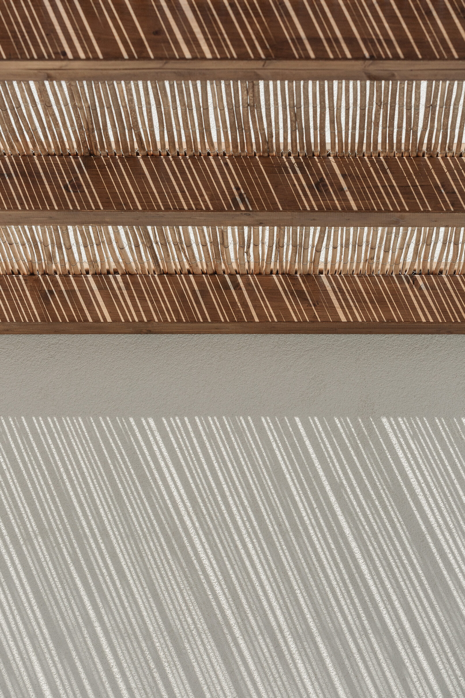 Discover La Natura Villas, an exclusive complex of luxury vacation homes in Naxos, designed by PLINTHOS Architects to blend seamlessly with the Cycladic landscape and offer breathtaking Aegean views.